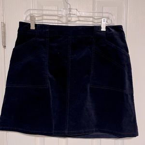 Blue velvety mini skirt with pockets NWT